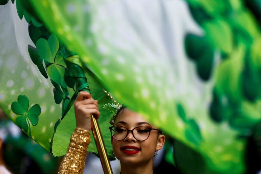 A reveller walks in St. Patrick's Day parade in Dublin, Ireland March 17, 2024. REUTERS/Clodagh Kilcoyne