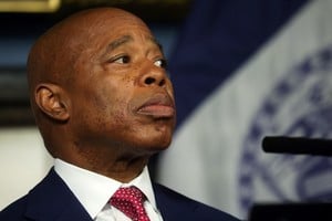 FILE PHOTO: New York City Mayor Eric Adams looks on during a press conference amid an election fundraising controversy at City Hall in Manhattan in New York City, U.S., November 14, 2023. REUTERS/Mike Segar/File Photo