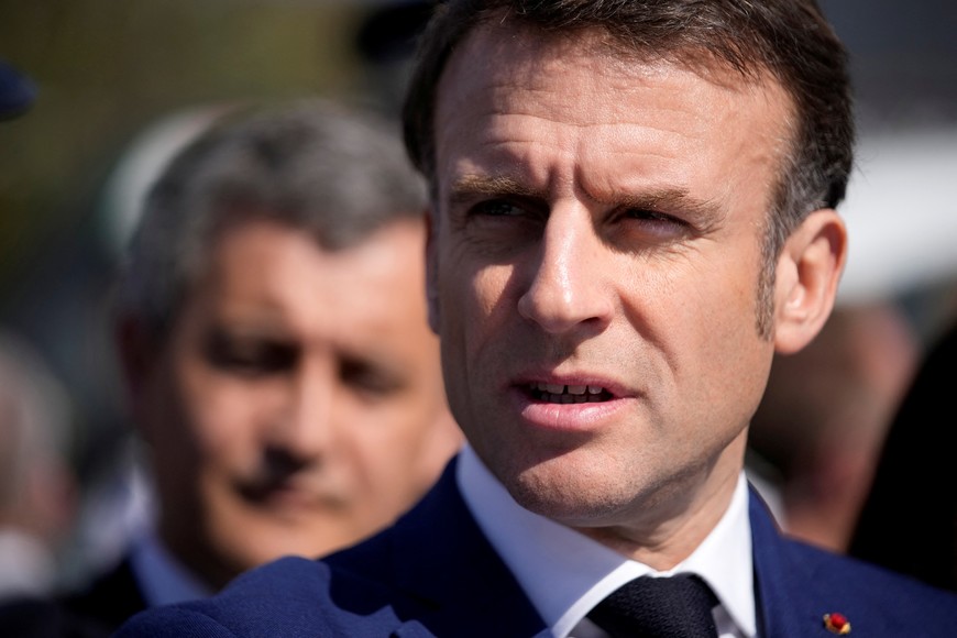 French President Emmanuel Macron takes part in a visit focusing on security and the fight against drug trafficking, in La Castellane district of Marseille, southern France March 19, 2024.     Christophe Ena/Pool via REUTERS