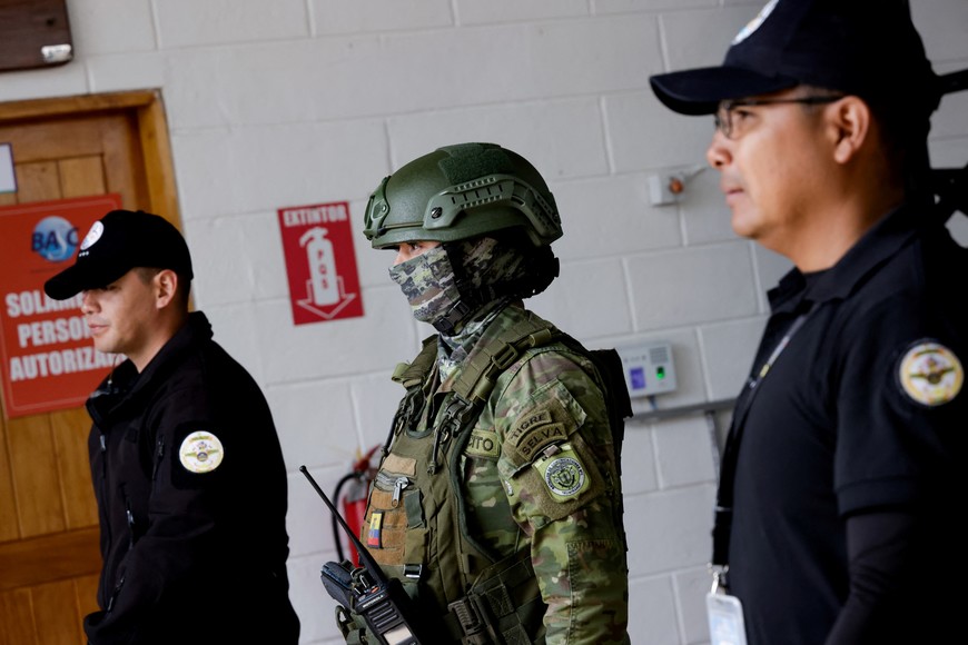 Security personnel stand ahead of a youth employment event amid escalating tension with Mexico after Ecuador stormed Mexico's embassy in Quito to arrest a politician wanted on graft charges, in El Quinche, Ecuador April 8, 2024. REUTERS/Karen Toro