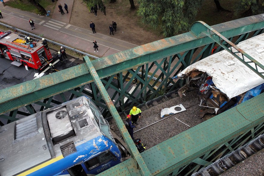 A drone view shows rescue teams working on the site of a train collision in Buenos Aires, Argentina, May 10, 2024. REUTERS/Agustin Marcarian