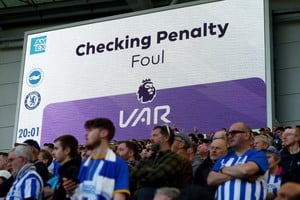 Soccer Football - Premier League - Brighton & Hove Albion v Chelsea - The American Express Community Stadium, Brighton, Britain - May 15, 2024
General view of the big screen during a VAR review before a penalty is overturned Action Images via Reuters/Paul Childs EDITORIAL USE ONLY. NO USE WITH UNAUTHORIZED AUDIO, VIDEO, DATA, FIXTURE LISTS, CLUB/LEAGUE LOGOS OR 'LIVE' SERVICES. ONLINE IN-MATCH USE LIMITED TO 120 IMAGES, NO VIDEO EMULATION. NO USE IN BETTING, GAMES OR SINGLE CLUB/LEAGUE/PLAYER PUBLICATIONS. PLEASE CONTACT YOUR ACCOUNT REPRESENTATIVE FOR FURTHER DETAILS..
