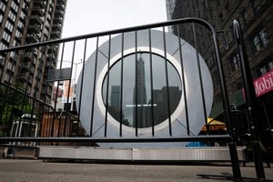 A message is displayed and a gate has been placed around The Portal, a public technology sculpture that links with direct connection between Dublin, Ireland and the Flatiron district in Manhattan, after it had been temporarily disabled due inappropriate behavior, in New York City, U.S., May 15, 2024.  REUTERS/Brendan McDermid