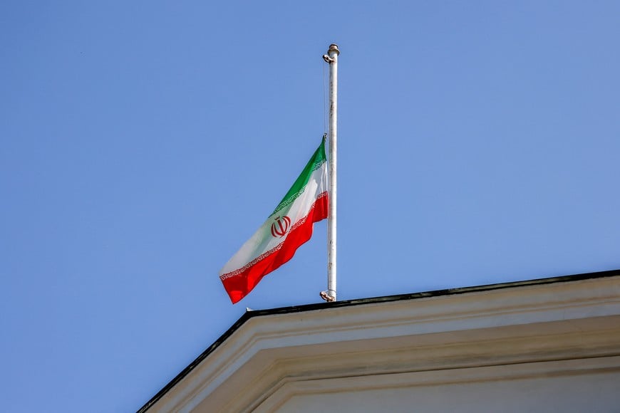 A flag flies at half-mast at the Iranian embassy, after Iran's Supreme Leader Ali Khamenei announced five days of mourning for President Ebrahim Raisi, Foreign Minister Hossein Amirabdollahian and other victims of a recent helicopter crash in mountainous terrain near Iran's border with Azerbaijan, in Moscow, Russia, May 20, 2024. REUTERS/Maxim Shemetov