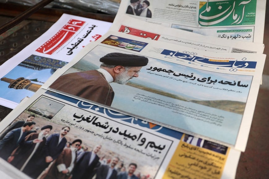 A newspaper with a picture of the late Iran's President Ebrahim Raisi is seen in Tehran, Iran May 20, 2024. Majid Asgaripour/WANA (West Asia News Agency) via REUTERS  ATTENTION EDITORS - THIS PICTURE WAS PROVIDED BY A THIRD PARTY