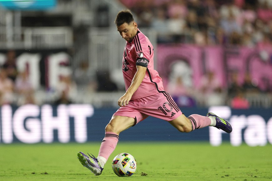 May 18, 2024; Fort Lauderdale, Florida, USA; Inter Miami CF forward Lionel Messi (10) kicks the ball in the second half against D.C. United at Chase Stadium. Mandatory Credit: Nathan Ray Seebeck-USA TODAY Sports