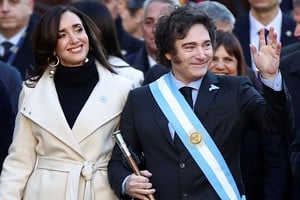 Argentina's President Javier Milei gestures as he walks accompanied by Vice President Victoria Villarruel towards the Buenos Aires' Cathedral for the traditional Te Deum to commemorate the 214th anniversary of the May Revolution, in Buenos Aires, Argentina, May 25, 2024. REUTERS/Agustin Marcarian