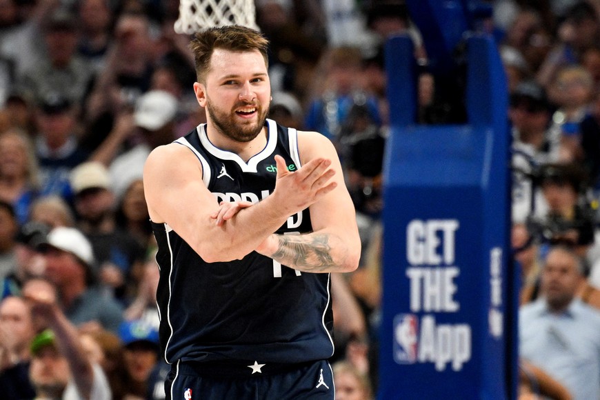 May 26, 2024; Dallas, Texas, USA; Dallas Mavericks guard Luka Doncic (77) reacts to being fouled against the Minnesota Timberwolves during the second half in game three of the western conference finals for the 2024 NBA playoffs at American Airlines Center. Mandatory Credit: Jerome Miron-USA TODAY Sports