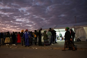 People queue to vote during the South African elections, in Cape Town, South Africa May 29, 2024. REUTERS/Esa Alexander