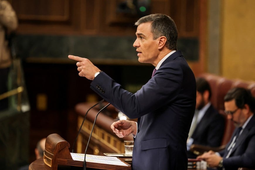 Spanish Prime Minister Pedro Sanchez gestures as he attends a plenary session of the lower house of the Spanish parliament, in Madrid, Spain, May 22, 2024. REUTERS/Violeta Santos Moura