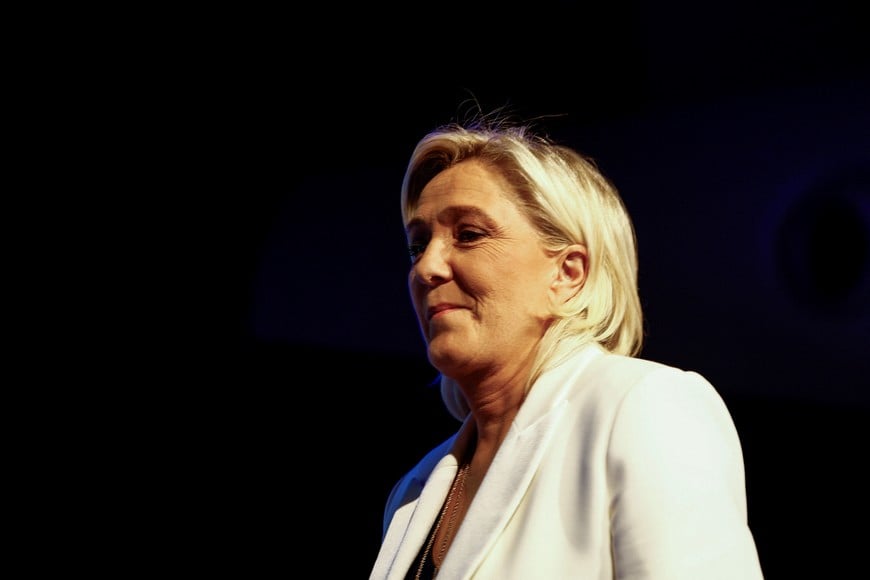 Marine Le Pen, President of the French far-right National Rally (Rassemblement National - RN) party parliamentary group, takes the stage to address party members after the polls closed during the European Parliament elections, in Paris, France, June 9, 2024. REUTERS/Sarah Meyssonnier