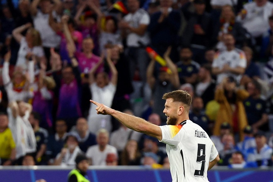 Soccer Football - Euro 2024 - Group A - Germany v Scotland - Munich Football Arena, Munich, Germany - June 14, 2024
Germany's Niclas Fullkrug celebrates scoring a goal before it was disallowed following a VAR review REUTERS/Leonhard Simon