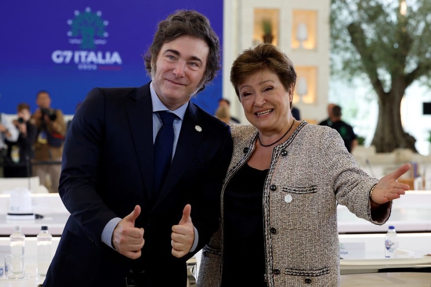 Managing director of the International Monetary Fund (IMF) Kristalina Georgieva and Argentina's President Javier Milei talk ahead of a session on Artificial Intelligence (AI), Energy, Africa and Mediterranean on the second day of the G7 summit in Borgo Egnazia, Italy, June 14, 2024. REUTERS/Louisa Gouliamaki