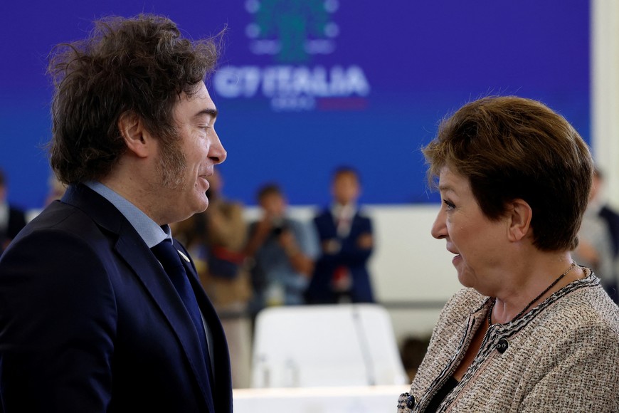 Managing director of the International Monetary Fund (IMF) Kristalina Georgieva and Argentina's President Javier Milei talk ahead of a session on Artificial Intelligence (AI), Energy, Africa and Mediterranean on the second day of the G7 summit in Borgo Egnazia, Italy, June 14, 2024. REUTERS/Louisa Gouliamaki