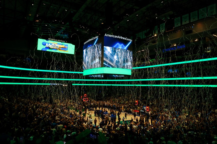 Jun 14, 2024; Dallas, Texas, USA; Confetti falls on the court after the game between the Dallas Mavericks and Boston Celtics after game four of the 2024 NBA Finals at American Airlines Center. Mandatory Credit: Kevin Jairaj-USA TODAY Sports