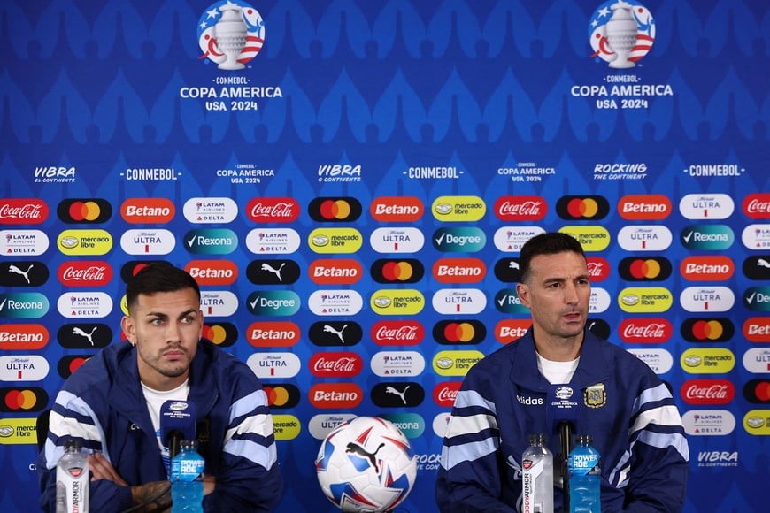 Soccer Football - Copa America 2024 - Argentina press conference - Mercedes-Benz Stadium, Atlanta, Georgia, United States - June 19, 2024
Argentina's Leandro Paredes and coach Lionel Scaloni during the press conference REUTERS/Agustin Marcarian