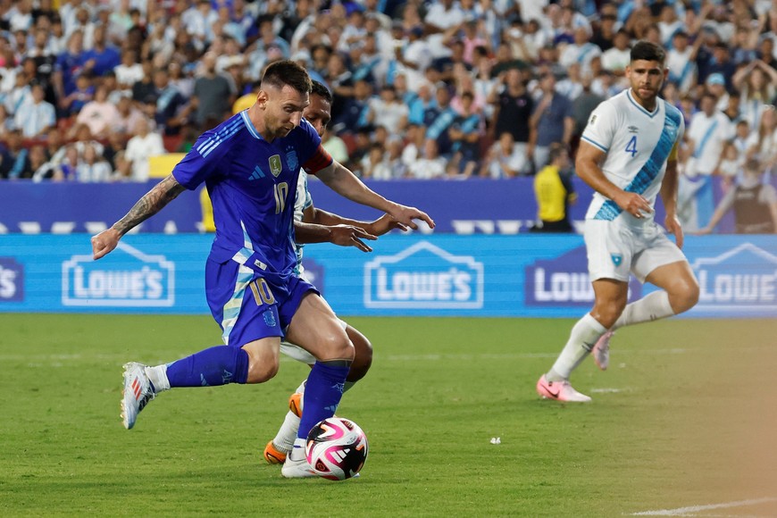 Jun 14, 2024; Landover, Maryland, USA; Argentina forward Lionel Messi (10) shoots the ball against Guatemala in the first half at Commanders Field. Mandatory Credit: Geoff Burke-USA TODAY Sports