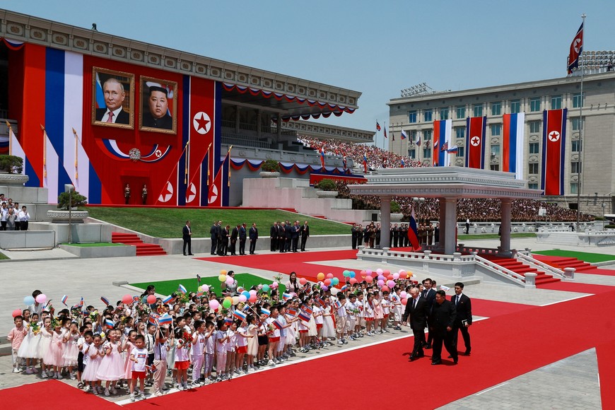 Russia's President Vladimir Putin and North Korea's leader Kim Jong Un attend an official welcoming ceremony at Kim Il Sung Square in Pyongyang, North Korea June 19, 2024. Sputnik/Vladimir Smirnov/Pool via REUTERS ATTENTION EDITORS - THIS IMAGE WAS PROVIDED BY A THIRD PARTY.