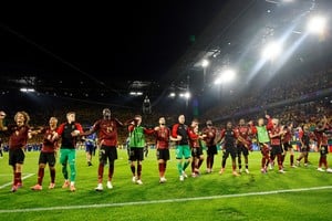Soccer Football - Euro 2024 - Group E - Belgium v Romania - Cologne Stadium, Cologne, Germany - June 22, 2024
Belgium players celebrate with their fans after the match REUTERS/Wolfgang Rattay
