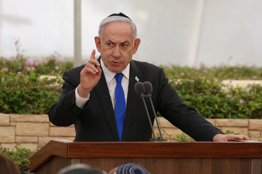 Israeli Prime Minister Benjamin Netanyahu attends the state memorial ceremony for the Altalena martyrs at the Nachalat Yitzhak cemetery in Givatayim, Israel, on 18 June 2024. Shaul Golan/Pool via REUTERS