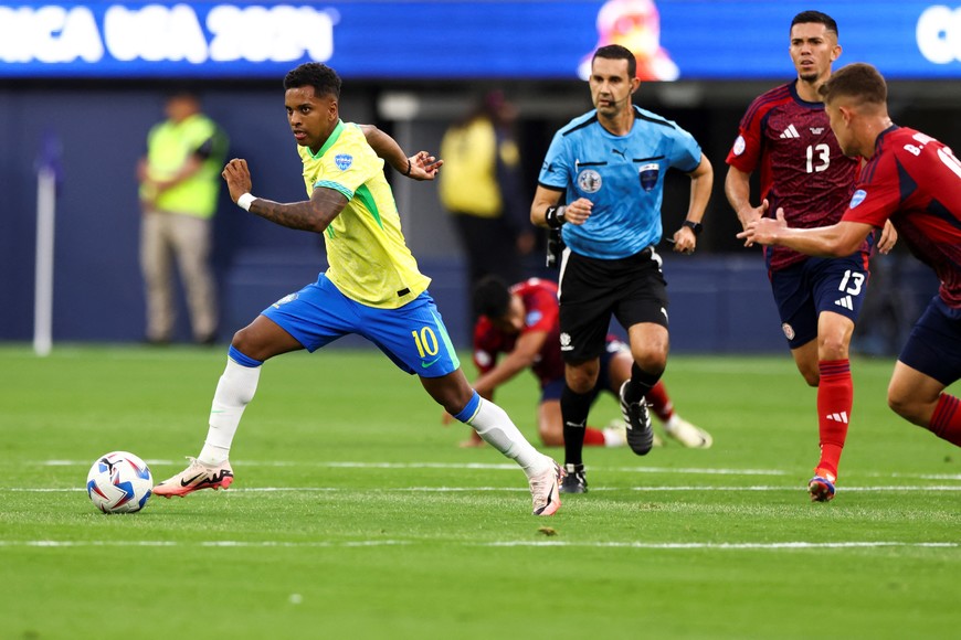 Jun 24, 2024; Inglewood, CA, USA; Brazil forward Rodrygo (10) dribbles the ball during first half of a match against Costa Rica at SoFi Stadium. Mandatory Credit: Jessica Alcheh-USA TODAY Sports