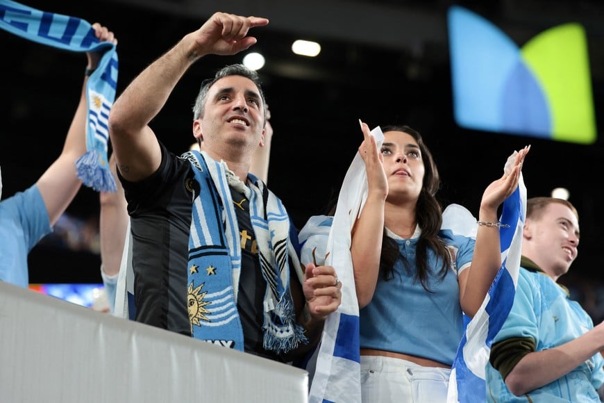 Jun 27, 2024; East Rutherford, NJ, USA; Uruguay fans show their support during the second half of the Copa America match against Bolivia at MetLife Stadium. Mandatory Credit: Vincent Carchietta-USA TODAY Sports