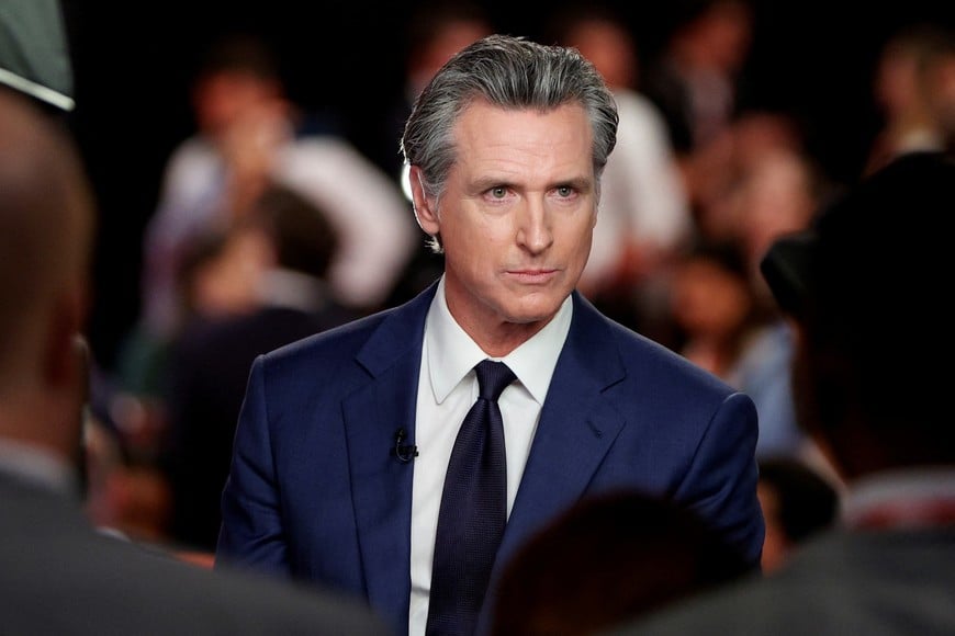 California Governor Gavin Newsom (D) reacts as he speaks to the members of the press on the day of the first presidential debate hosted by CNN in Atlanta, Georgia, U.S., June 27, 2024. REUTERS/Marco Bello