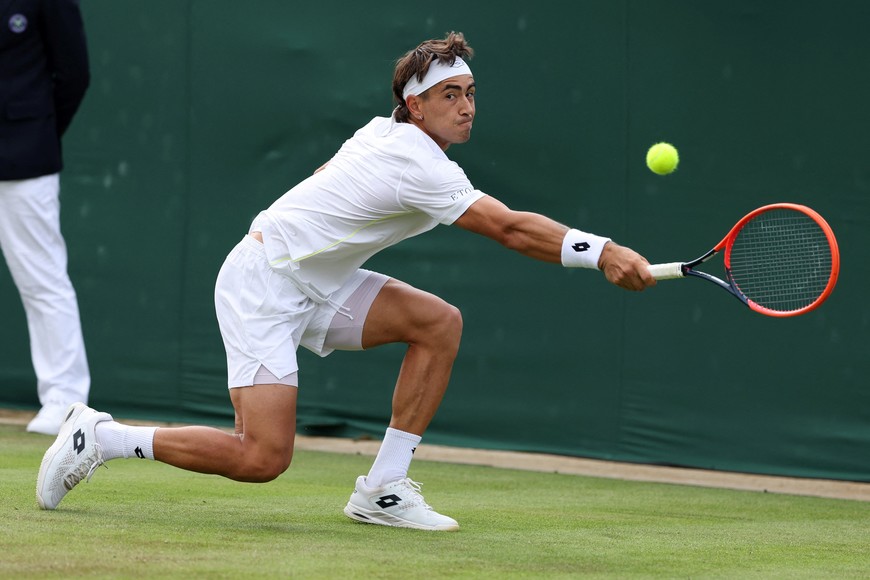 Tennis - Wimbledon - All England Lawn Tennis and Croquet Club, London, Britain - July 2, 2024
Australia's Francisco Comesana in action during his first round match against Russia's Andrey Rublev REUTERS/Isabel Infantes