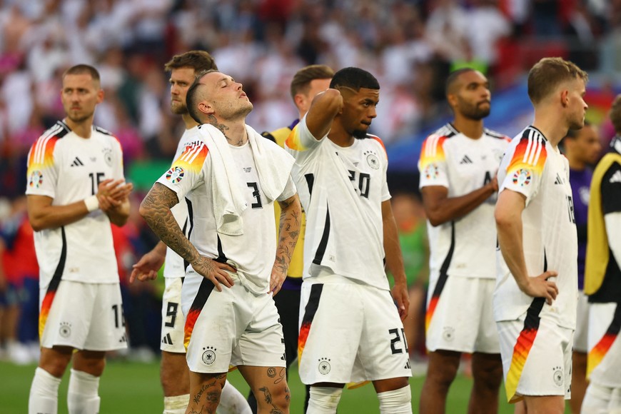 Soccer Football - Euro 2024 - Quarter Final - Spain v Germany - Stuttgart Arena, Stuttgart, Germany - July 5, 2024
Germany's David Raum looks dejected after the match REUTERS/Kai Pfaffenbach