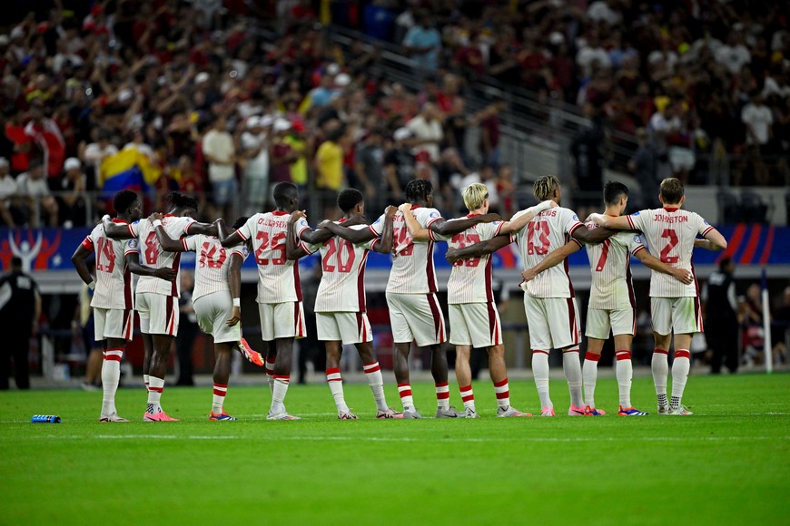 Jul 5, 2024; Arlington, TX, USA; Team Canada huddles up during penalty kicks against the Venezuela in the 2024 Copa America quarterfinal at AT&T Stadium. Mandatory Credit: Jerome Miron-USA TODAY Sports