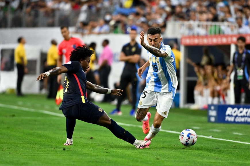 Jul 4, 2024; Houston, TX, USA; Argentina's striker Nicolas Gonzalez (15) and Ecuador’s midfielder Angelo Preciado (17) in action during the first half in a Copa America quarterfinal soccer match at NRG Stadium. Mandatory Credit: Maria Lysaker-USA TODAY Sports