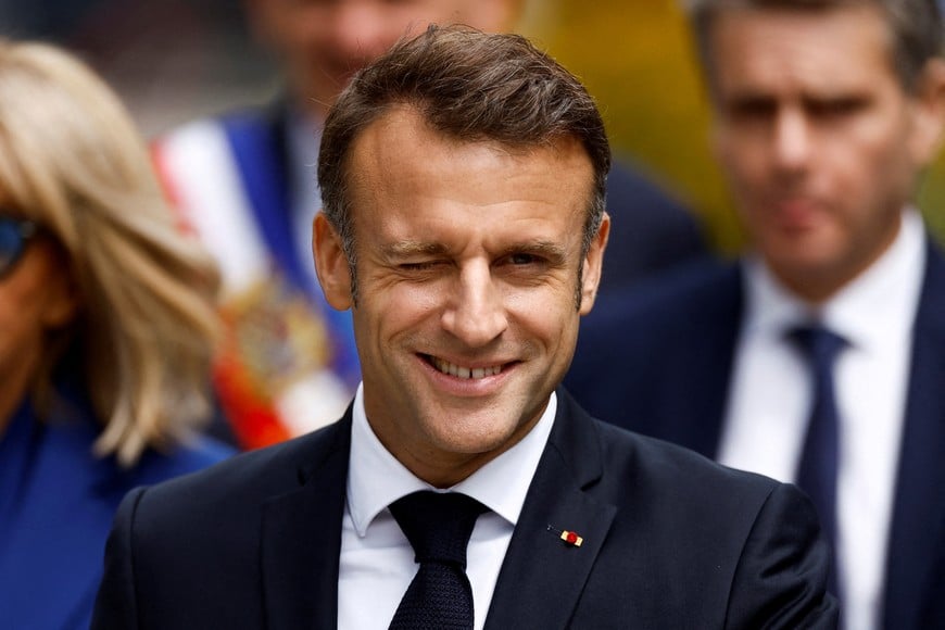 French President Emmanuel Macron leaves after voting in the second round of the early French parliamentary elections, at a polling station in Le Touquet-Paris-Plage, France, July 7, 2024. REUTERS/Christian Hartmann     TPX IMAGES OF THE DAY