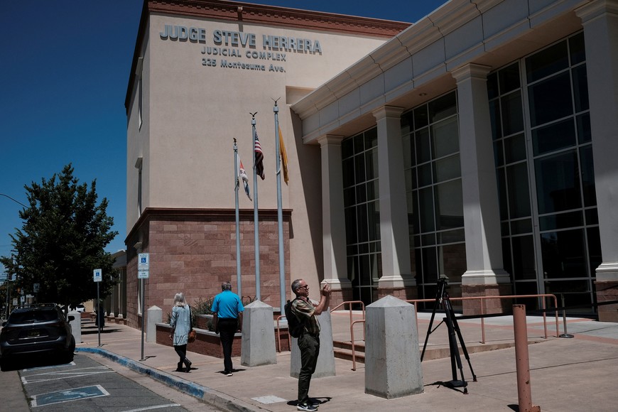 A person stands outside the courthouse, as jury selection begins in actor Alec Baldwin's manslaughter trial for the 2021 fatal shooting of cinematographer Halyna Hutchins during the filming of the Western movie "Rust", in Santa Fe, New Mexico, U.S. July 9, 2024. REUTERS/Ramsay de Give