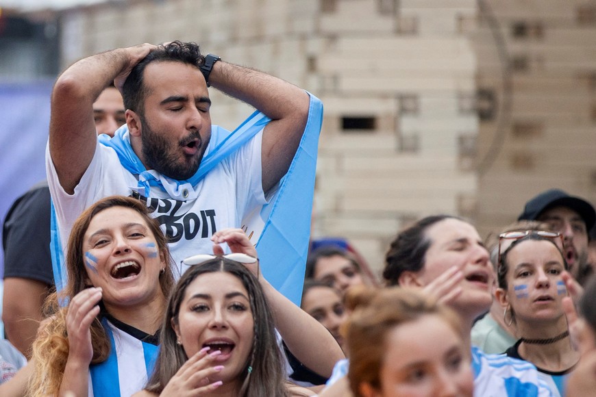 Argentina soccer fans react while watching the televised Copa America semi-final match between Canada and Argentina, in Toronto, Ontario, Canada July 9, 2024.  REUTERS/Carlos Osorio