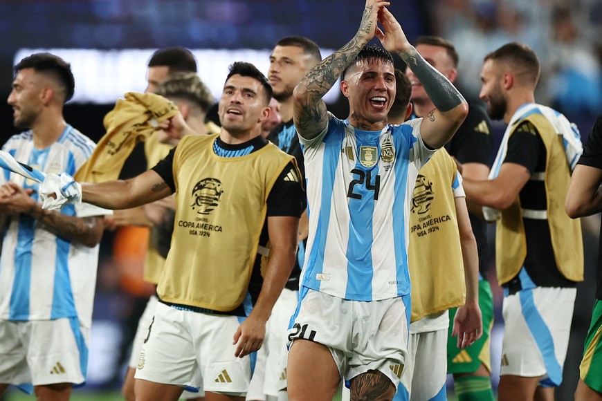 Soccer Football - Copa America 2024 - Semi Final - Argentina v Canada - MetLife Stadium, East Rutherford, New Jersey, United States - July 9, 2024
Argentina's Enzo Fernandez celebrates after the match with teammates REUTERS/Agustin Marcarian