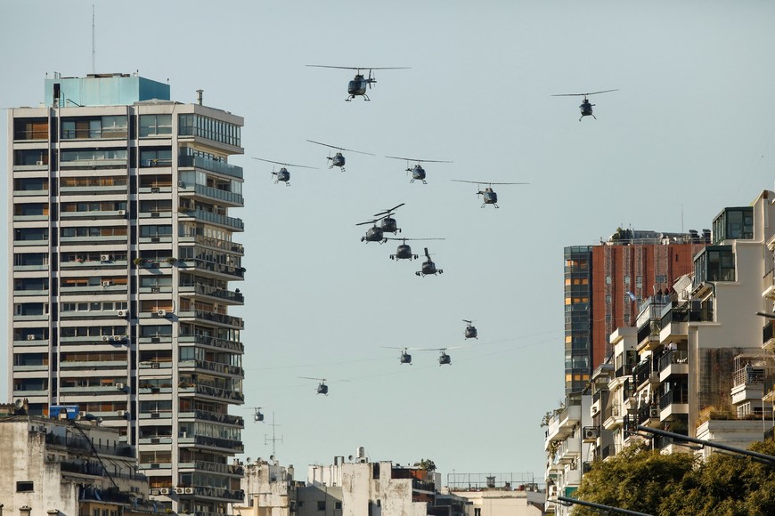 Helicopters fly during an event commemorating the 208th anniversary of the country's independence from Spain in 1816, in Buenos Aires, Argentina, July 9, 2024. REUTERS/Martin Cossarini