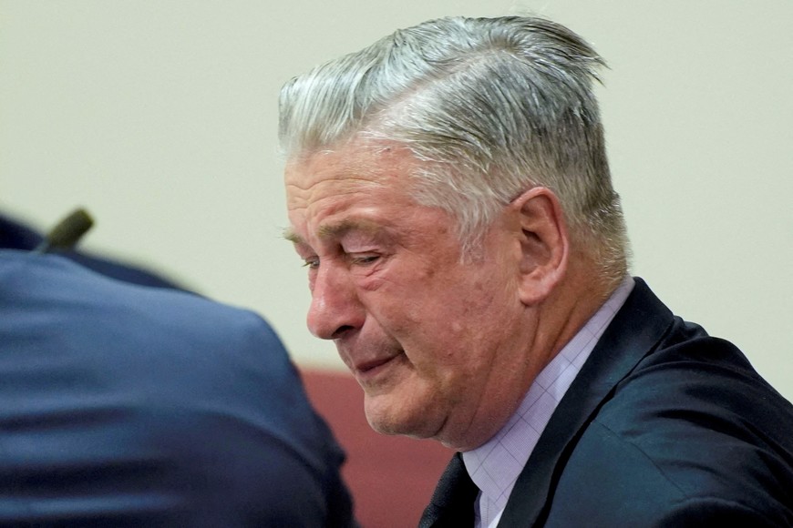 Actor Alec Baldwin reacts during his trial on involuntary manslaughter at Santa Fe County District Court in Santa Fe, New Mexico, on July 12, 2024. In October 2021, on the New Mexico set of the Western movie "Rust," a gun pointed by Baldwin discharged a live round, killing the film's cinematographer Halyna Hutchins and wounding its director.  Baldwin's trial for involuntary manslaughter was dismissed by a judge Friday after she ruled that key evidence over a fatal shooting on the set of "Rust" had been withheld from the defense.    
   RAMSAY DE GIVE/Pool via REUTERS     TPX IMAGES OF THE DAY