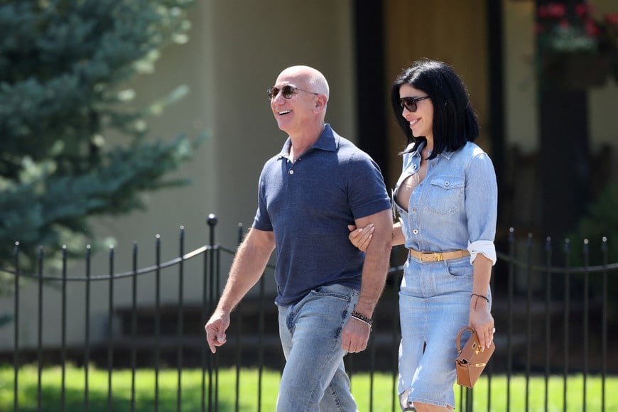 Jeff Bezos and Lauren Sanchez, attend the annual Allen and Co. Sun Valley Media and Technology Conference at the Sun Valley Resort in Sun Valley, Idaho, U.S., July 11, 2024.  REUTERS/Brendan McDermid