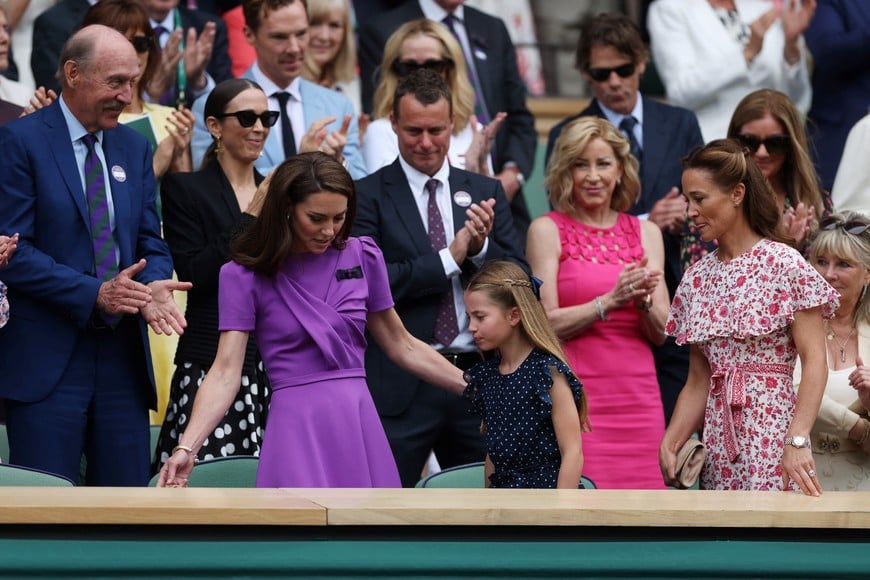 Tennis - Wimbledon - All England Lawn Tennis and Croquet Club, London, Britain - July 14, 2024
Britain's Catherine, Princess of Wales with Princess Charlotte and Pippa Middleton are seen in the royal box before the men's singles final REUTERS/Paul Childs