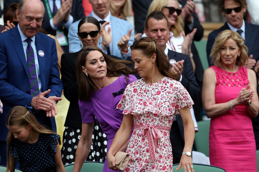 Tennis - Wimbledon - All England Lawn Tennis and Croquet Club, London, Britain - July 14, 2024
Britain's Catherine, Princess of Wales with Princess Charlotte and Pippa Middleton are seen in the royal box before the men's singles final REUTERS/Paul Childs