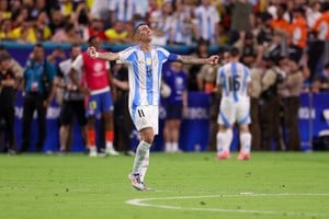 Jul 14, 2024; Miami, FL, USA;  Argentina midfielder Angel Di Maria (11) celebrates after a forward Lautaro Martínez (22) goal against Colombia in the second half during the Copa America Final at Hard Rock Stadium. Mandatory Credit: Nathan Ray Seebeck-USA TODAY Sports