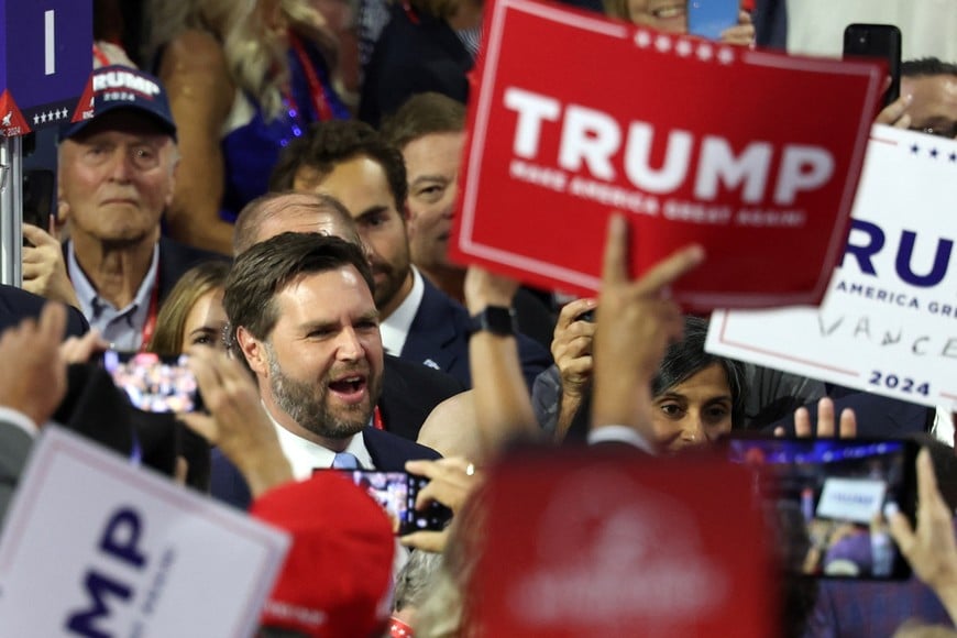 Republican vice presidential candidate J.D. Vance is greeted by supporters as he arrives for Day 1 of the Republican National Convention (RNC), at the Fiserv Forum in Milwaukee, Wisconsin, U.S., July 15, 2024. REUTERS/Mike Segar