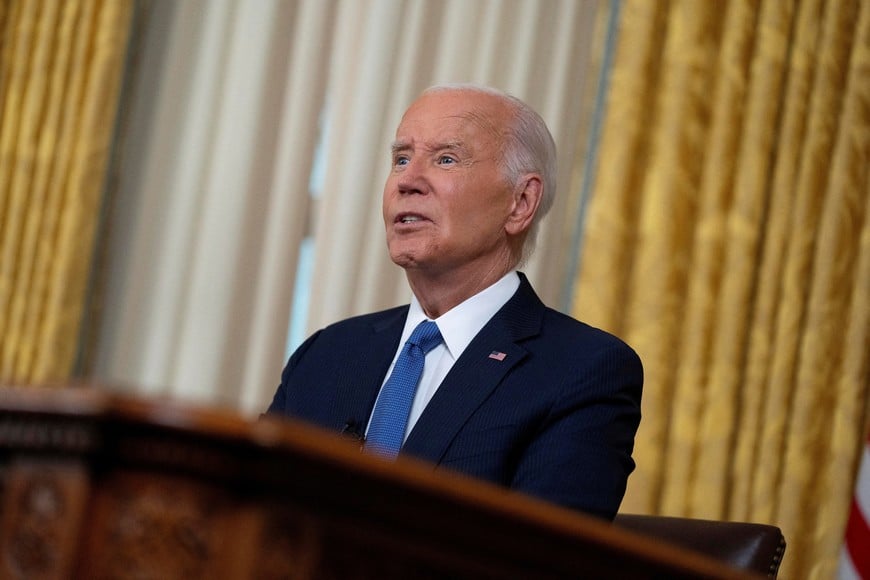 U.S. President Joe Biden addresses the nation from the Oval Office of the White House in Washington, Wednesday, July 24, 2024, about his decision to drop his Democratic presidential reelection bid.     Evan Vucci/Pool via REUTERS