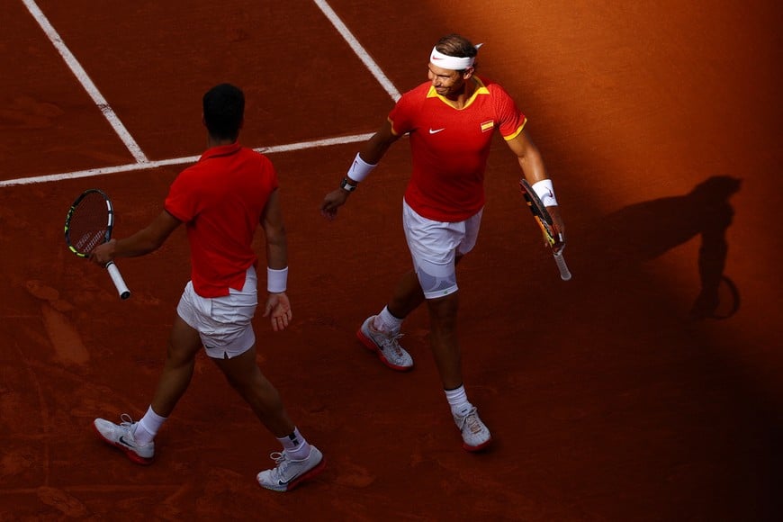 Paris 2024 Olympics - Tennis - Men's Doubles Second Round - Roland-Garros Stadium, Paris, France - July 30, 2024.
Carlos Alcaraz of Spain and Rafael Nadal of Spain react during their match against Tallon Griekspoor of Netherlands and Wesley Koolhof of Netherland. REUTERS/Edgar Su