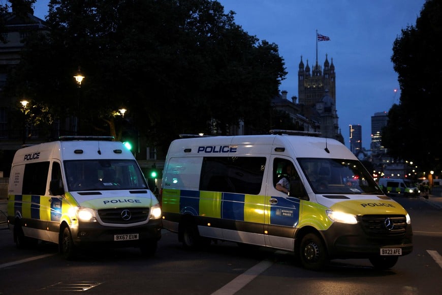 Official vehicles are pictured during a protest against illegal immigration, in London Britain, July 31, 2024. REUTERS/Hollie Adams