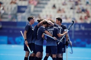 Paris 2024 Olympics - Hockey - Men's Pool B - Argentina vs Ireland - Yves-du-Manoir Stadium, Colombes, France - August 01, 2024.
Maico Casella Schuth of Argentina, Bautista Capurro Zubeldia of Argentina and Matias Rey of Argentina celebrate with teamamtes their second goal. REUTERS/Adnan Abidi