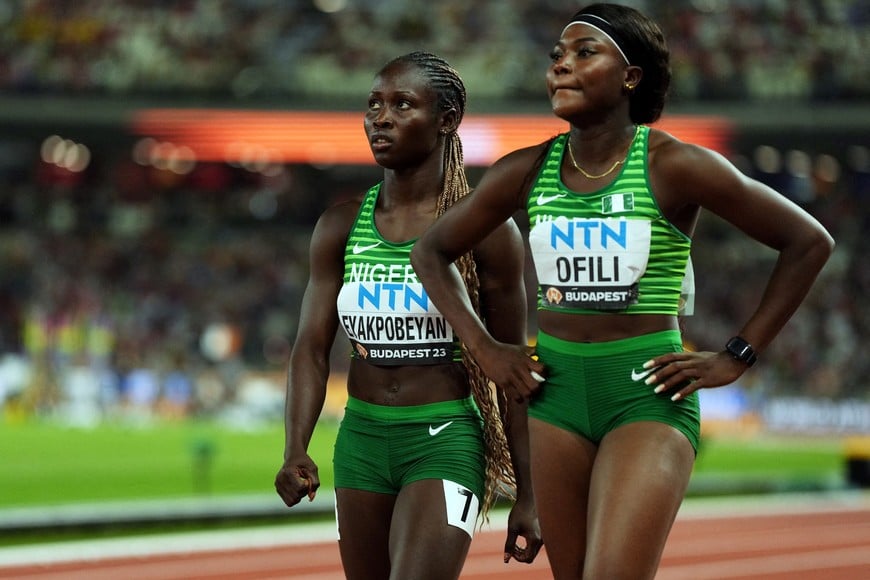 FILE PHOTO: Athletics - World Athletics Championship - Women's 4x100m Relay Heats - National Athletics Centre, Budapest, Hungary - August 25, 2023
Nigeria's Favour Ofili look dejected after heat 2 REUTERS/Aleksandra Szmigiel/File Photo