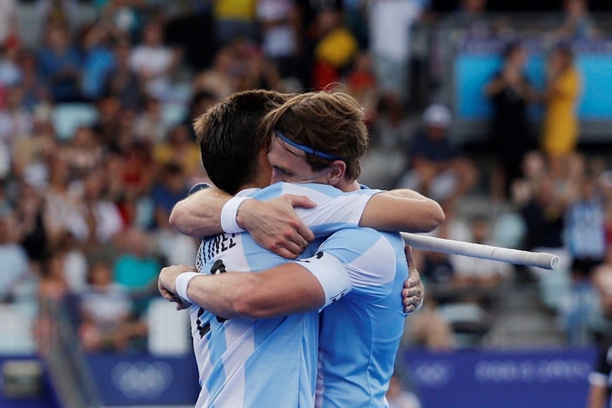 Paris 2024 Olympics - Hockey - Men's Pool B - Argentina vs New Zealand - Yves-du-Manoir Stadium, Colombes, France - July 30, 2024.
Lucas Martinez of Argentina and Maico Casella Schuth of Argentina celebrate their second goal. REUTERS/Anushree Fadnavis