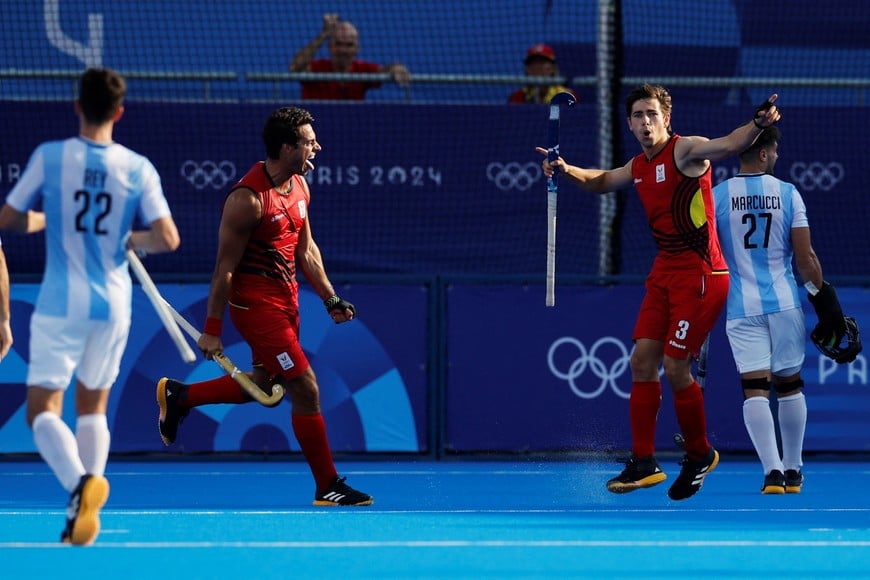 Paris 2024 Olympics - Hockey - Men's Pool B - Belgium vs Argentina - Yves-du-Manoir Stadium, Colombes, France - August 02, 2024.
Thibeau Stockbroekx of Belgium and Alexander Hendrickx of Belgium celebrate their third goal. REUTERS/Anushree Fadnavis