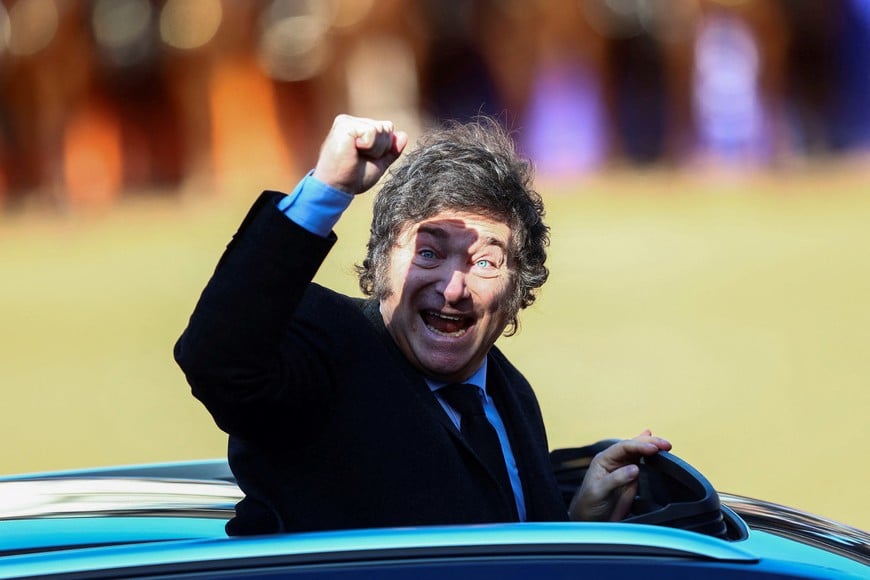 Argentina's President Javier Milei gestures as he arrives to attend the official opening ceremony of the 136th Rural Society's annual exposition, in Buenos Aires, Argentina, July 28, 2024. REUTERS/Matias Baglietto